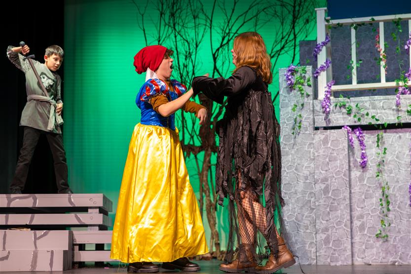 Students perform onstage